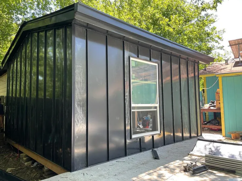 Black standing seam metal wall panels for Roof Inspection in Charlotte